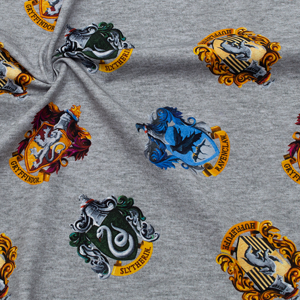1,20 Meter - Lizenz Baumwoll  Stretch Jersey "Harry Potter Haus Logos" Farbe Grau
